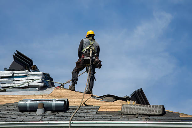 Professional Roofing technician working in West Brookfield, MA
